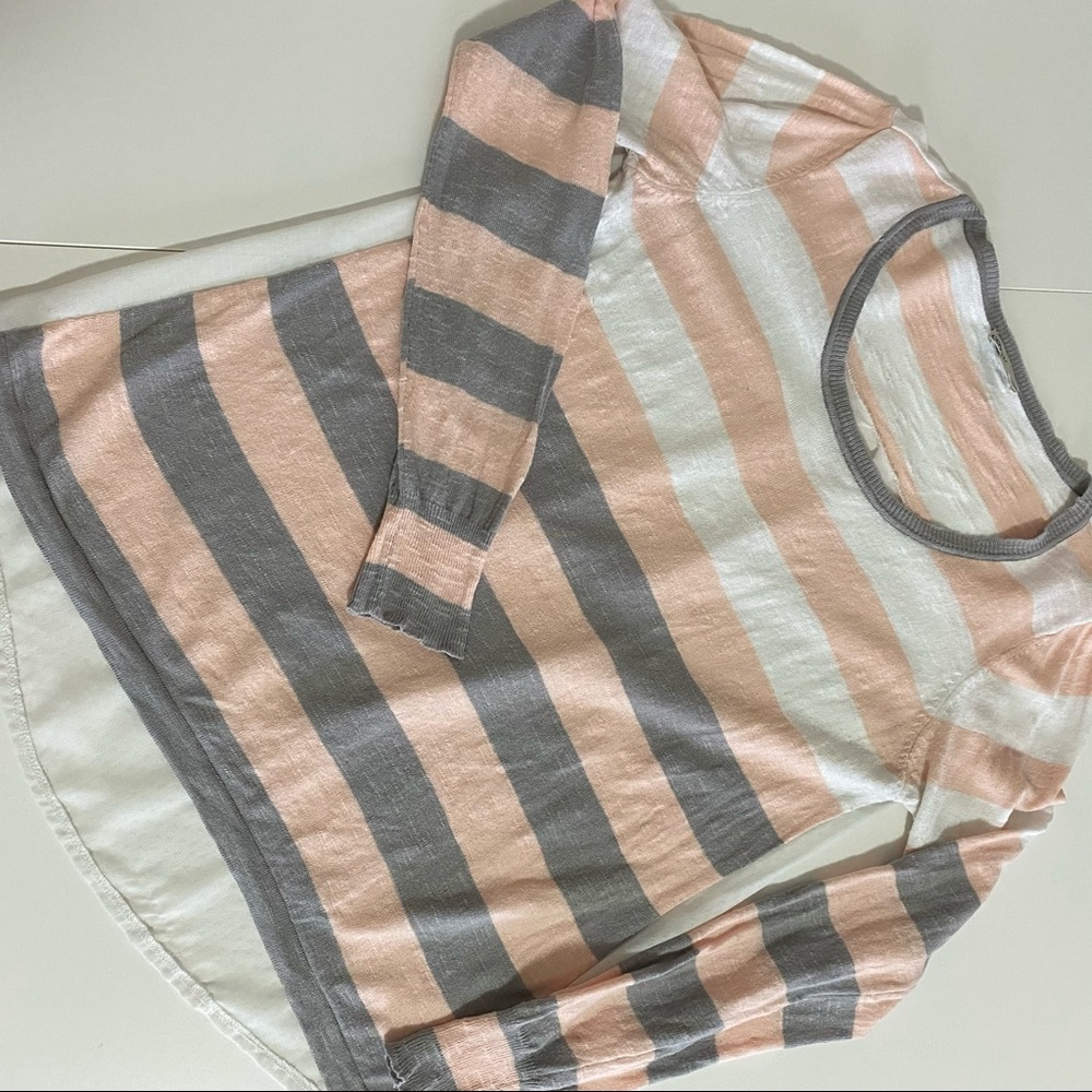 Sheer back striped sweater.